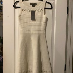 French Connection white/off white sleeveless dress with details.
